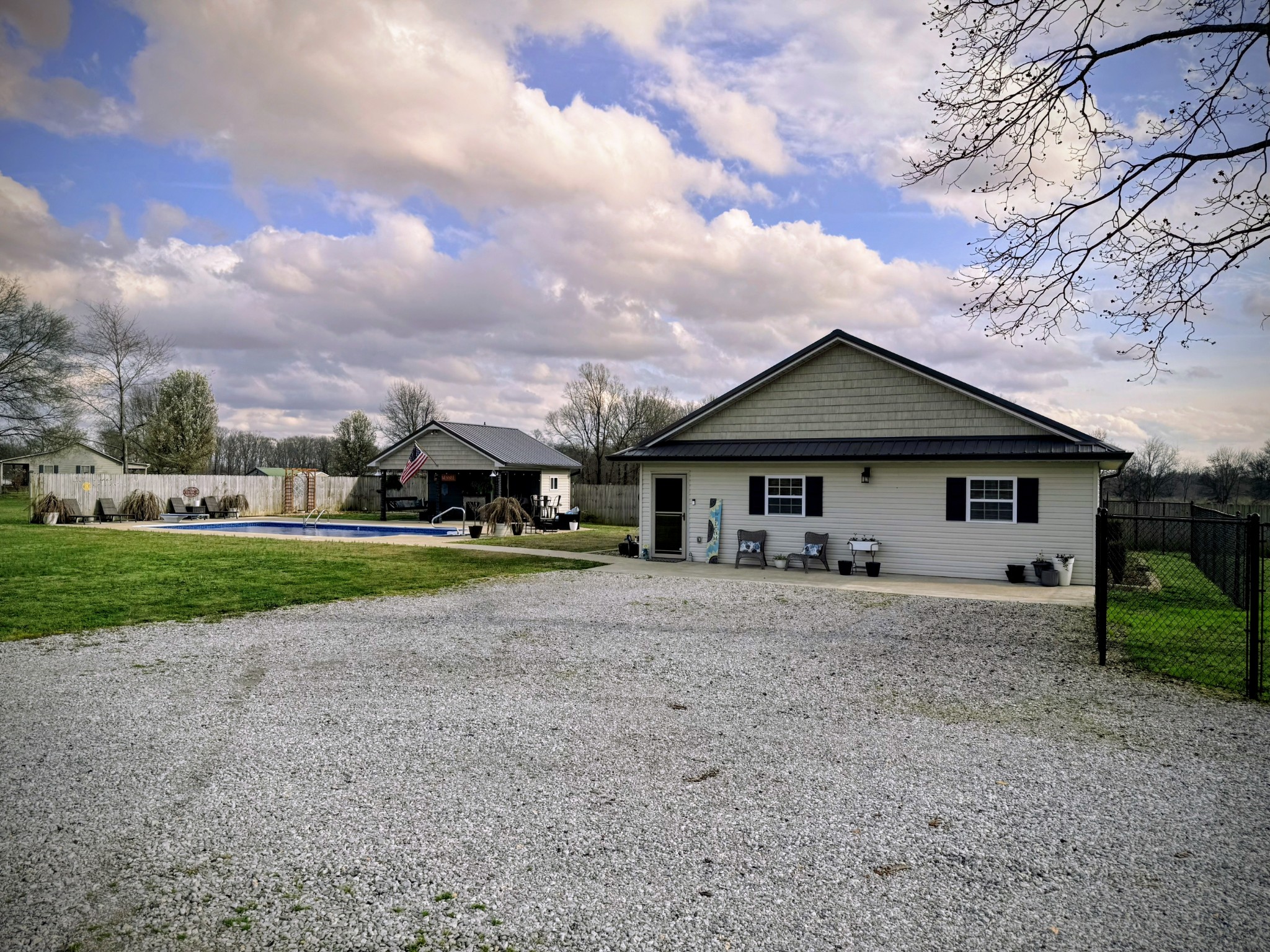 99 Busby Road Loretto, TN 38469 - Photo 3 of 25 a front view of a house with a yard