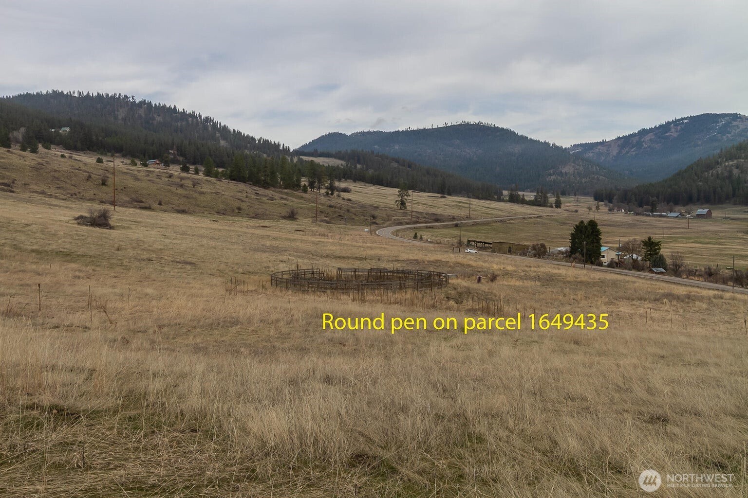 3600-block Beck Road Rice, WA 99167 - Photo 14 of 23 a view of a town with mountains in the background
