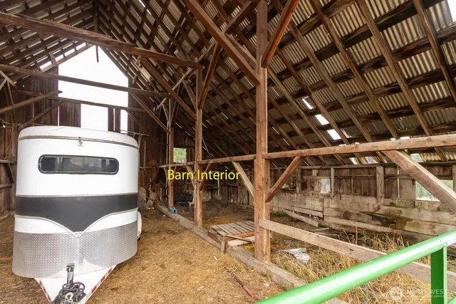 a view of a balcony with chairs
