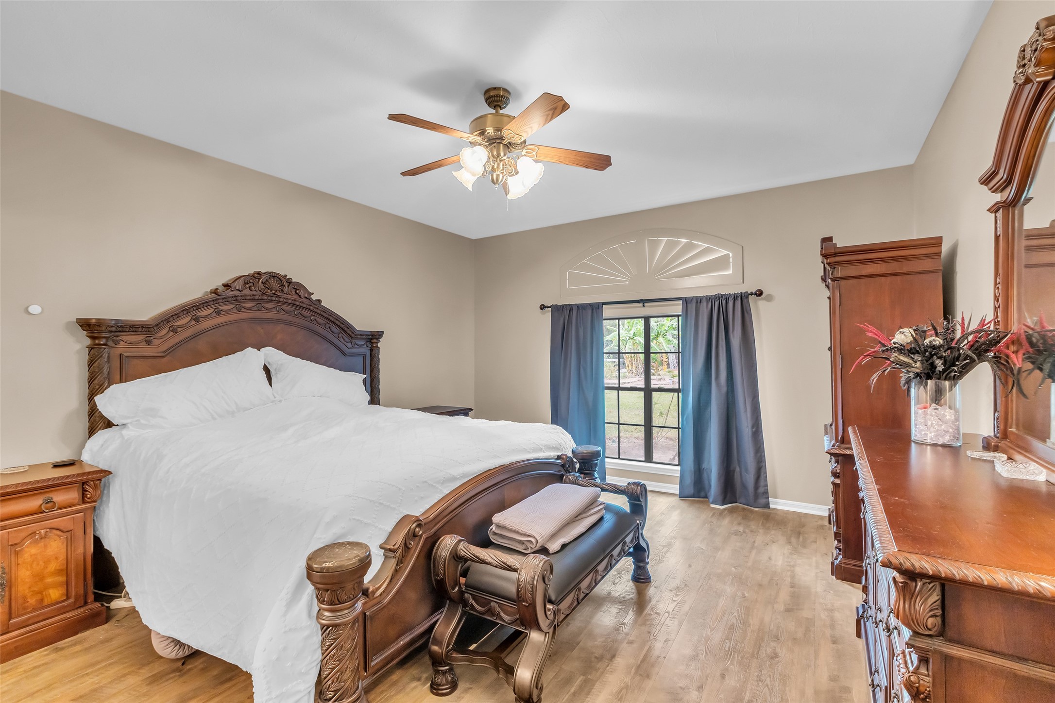 28414 Dobbin-Huffsmith Road Magnolia, TX 77354 - Photo 14 of 39 a bedroom with a bed and wooden floor
