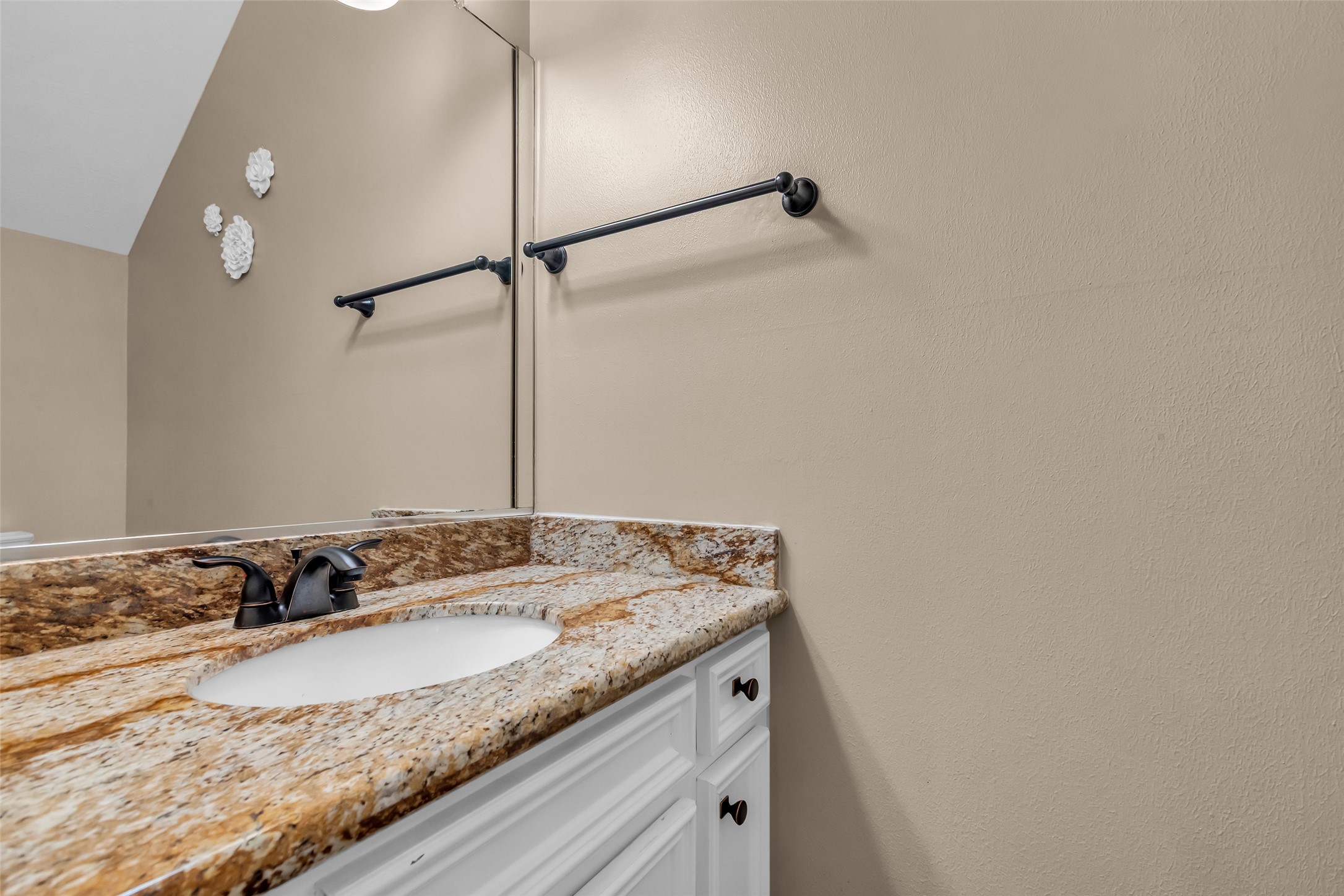 28414 Dobbin-Huffsmith Road Magnolia, TX 77354 - Photo 17 of 39 a bathroom with a granite countertop sink and a mirror
