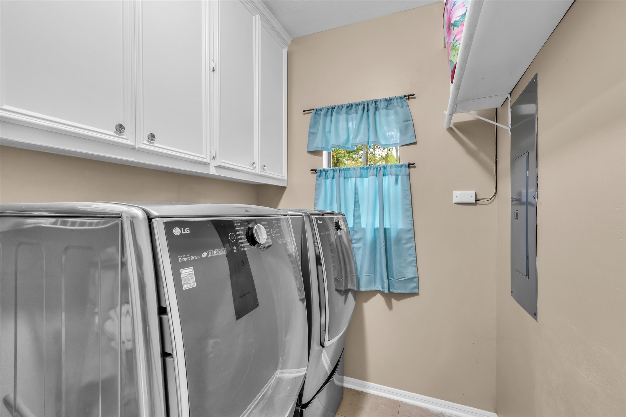 28414 Dobbin-Huffsmith Road Magnolia, TX 77354 - Photo 18 of 39 a close view of a refrigerator in kitchen and stainless steel appliances wooden floor