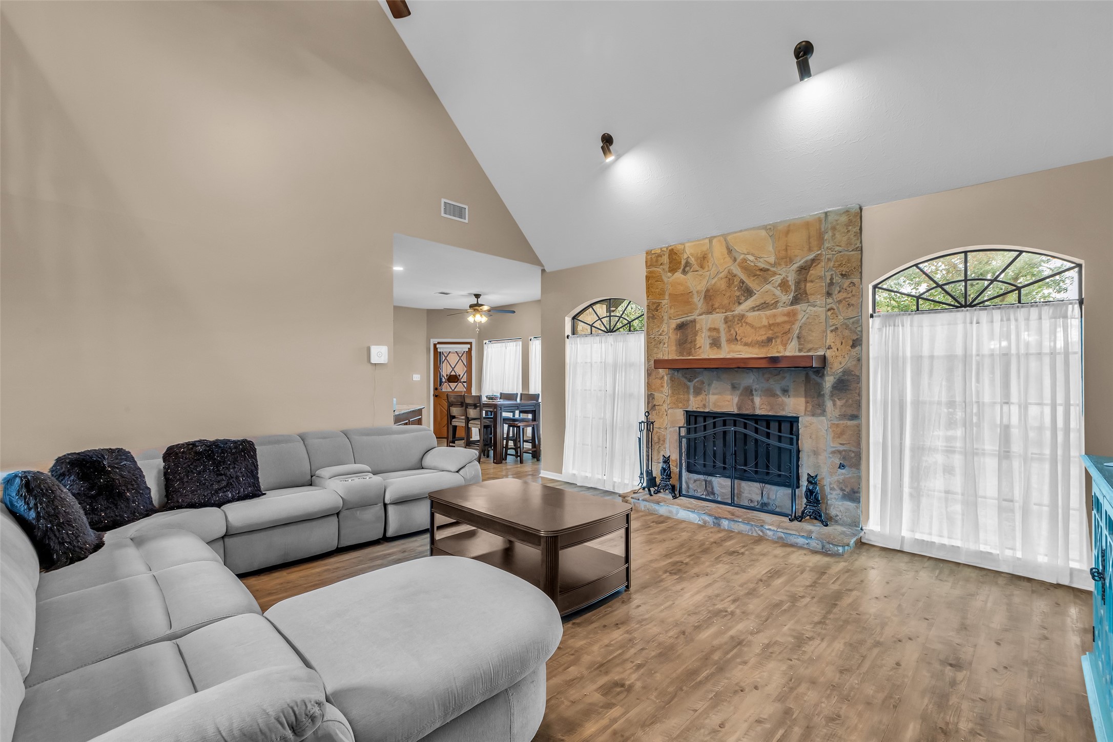 28414 Dobbin-Huffsmith Road Magnolia, TX 77354 - Photo 20 of 39 a living room with furniture and a fireplace