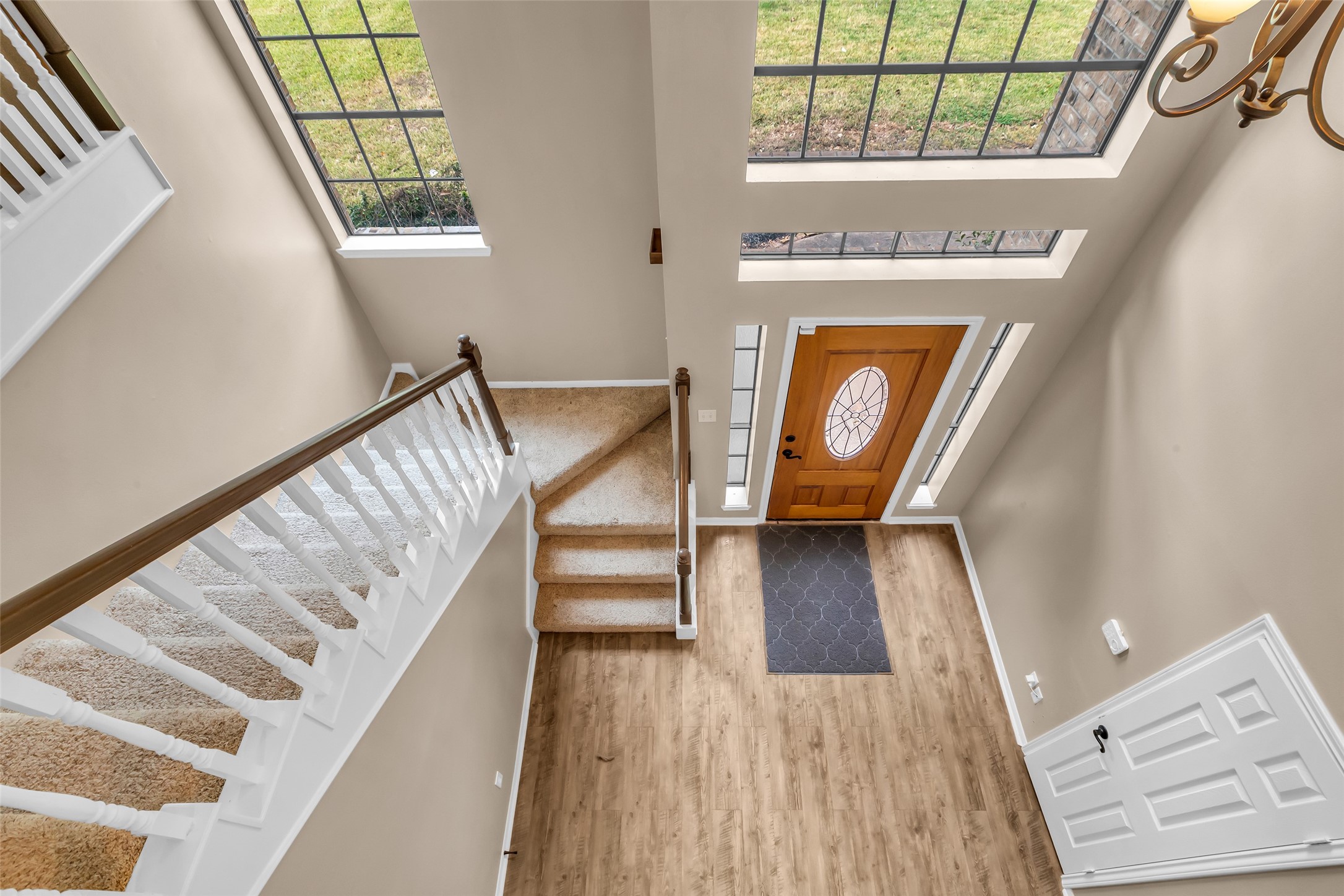 28414 Dobbin-Huffsmith Road Magnolia, TX 77354 - Photo 23 of 39 a view of a hallway with wooden floor staircase and door