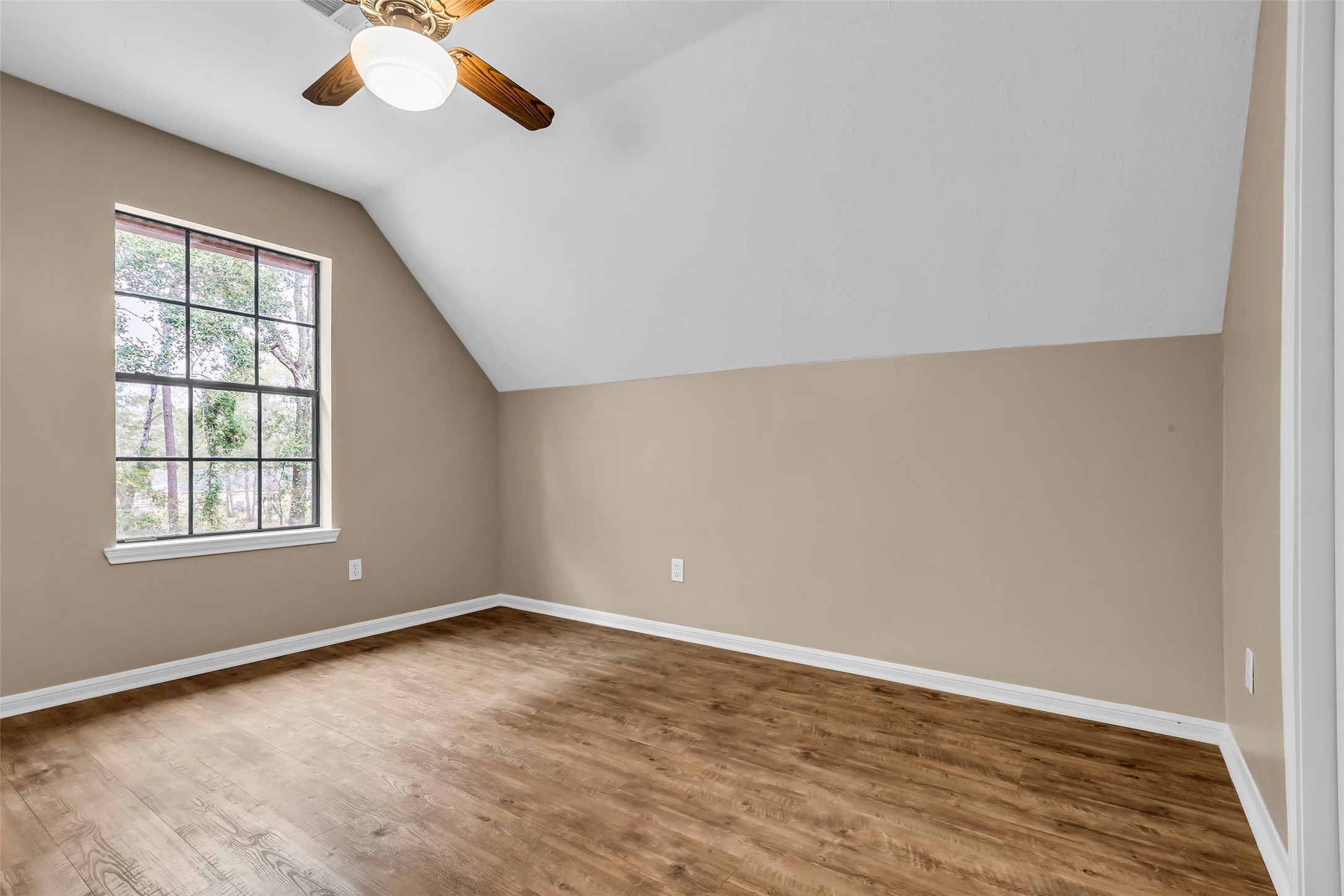 28414 Dobbin-Huffsmith Road Magnolia, TX 77354 - Photo 27 of 39 an empty room with a window