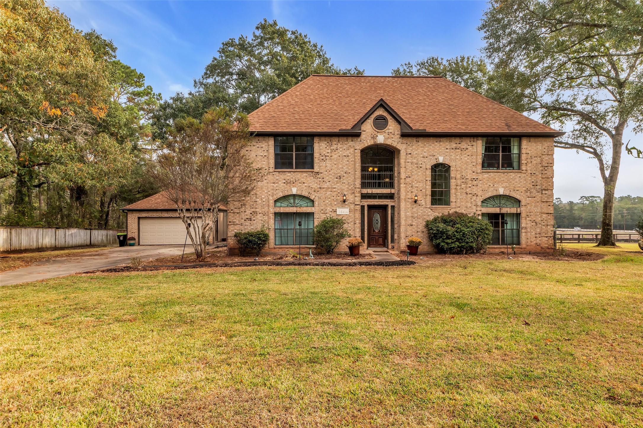 28414 Dobbin-Huffsmith Road Magnolia, TX 77354 - Photo 28 of 39 a view of a house with pool and chairs