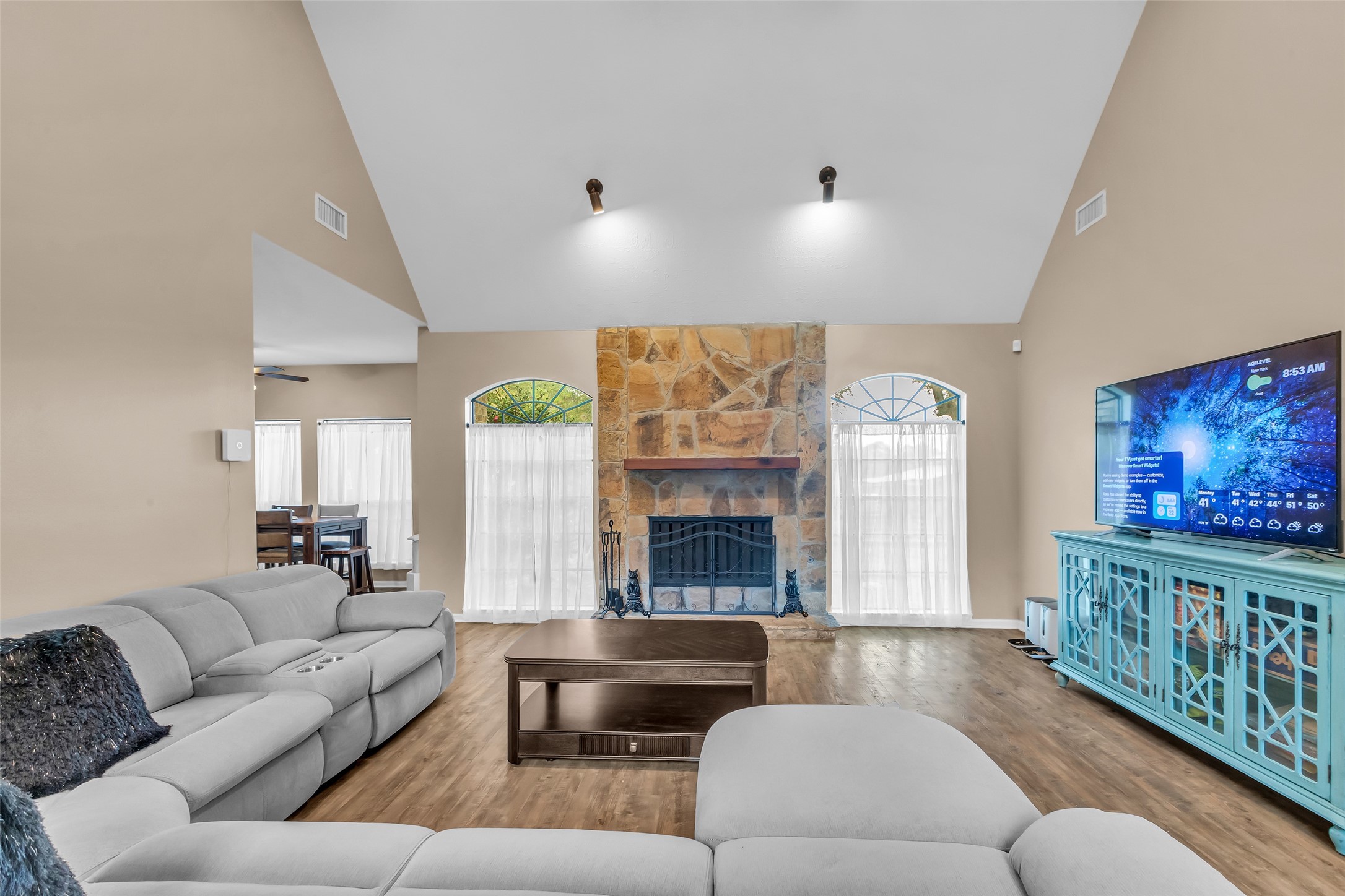 28414 Dobbin-Huffsmith Road Magnolia, TX 77354 - Photo 4 of 39 a living room with furniture and a fireplace