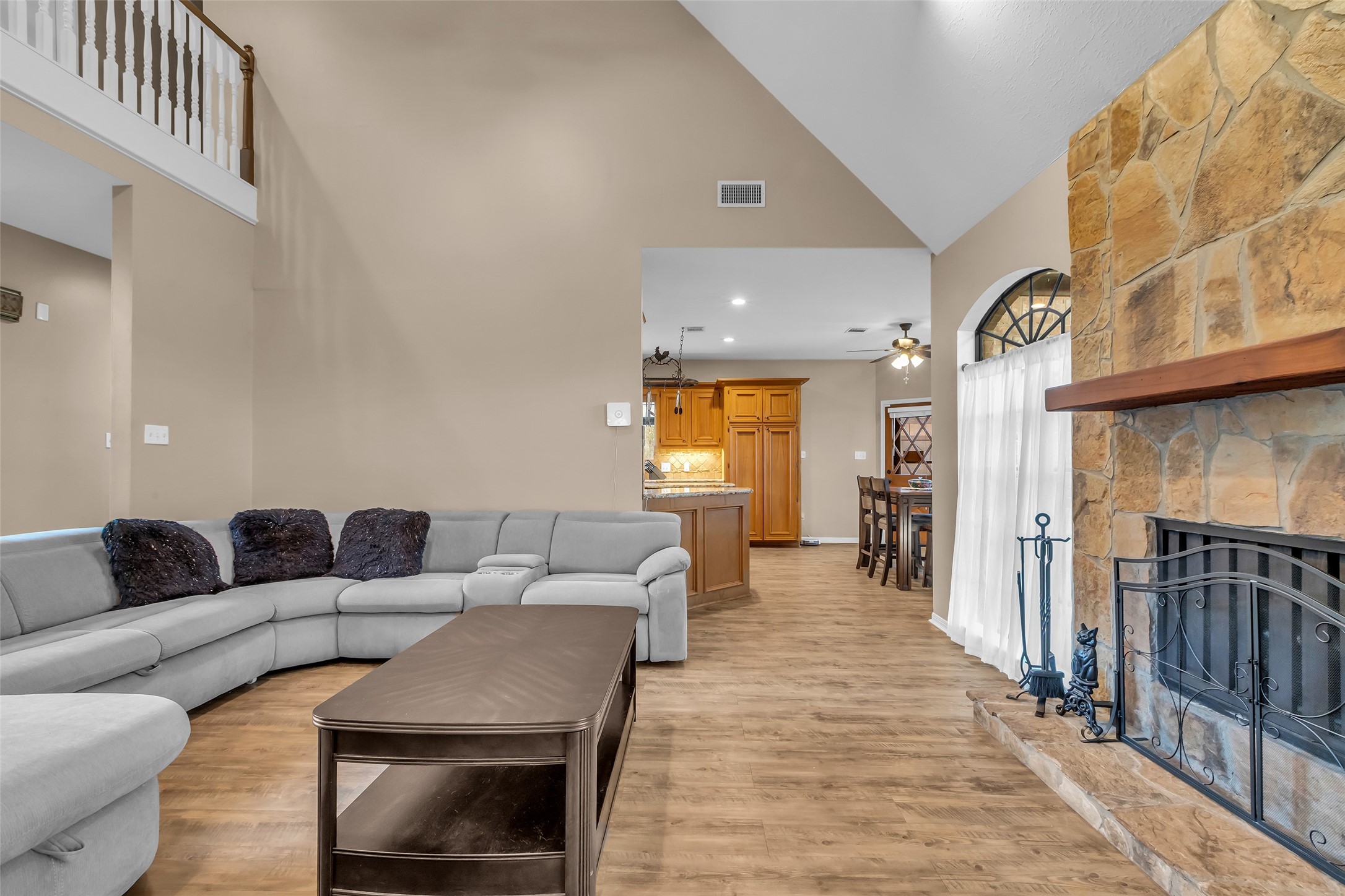 28414 Dobbin-Huffsmith Road Magnolia, TX 77354 - Photo 8 of 39 a living room with furniture and a fireplace