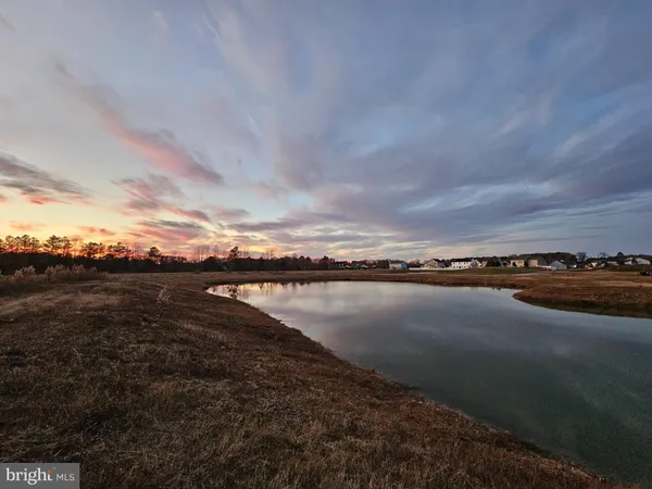 a view of sunset and lake