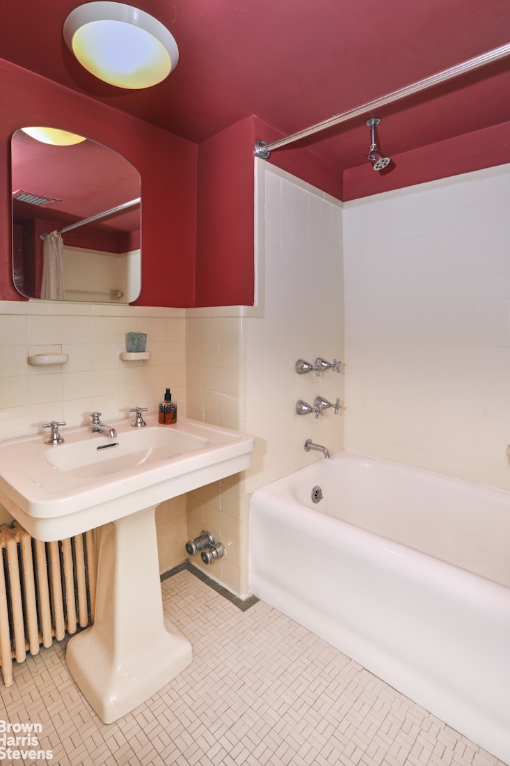 2 Beekman Place, Unit 15/16C Manhattan, NY 10022 - Photo 13 of 18 a bathroom with a sink and a bathtub