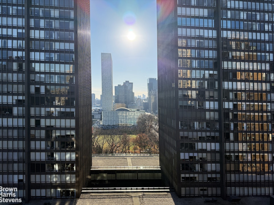 2 Beekman Place, Unit 15/16C Manhattan, NY 10022 - Photo 8 of 18 a view of a city from a balcony