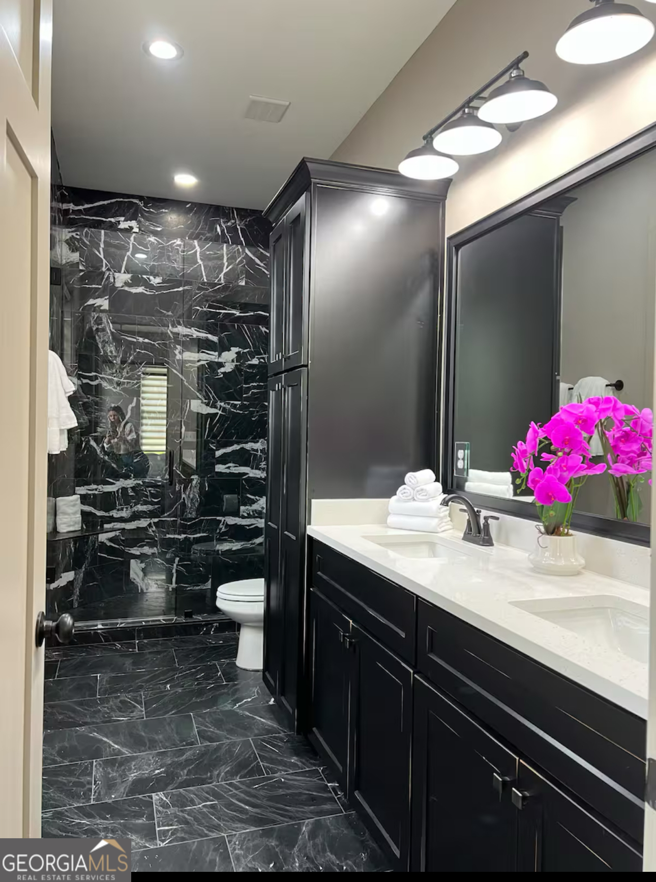 950 Island Shoals Road Jackson, GA 30233 - Photo 11 of 20 a bathroom with a sink and a mirror