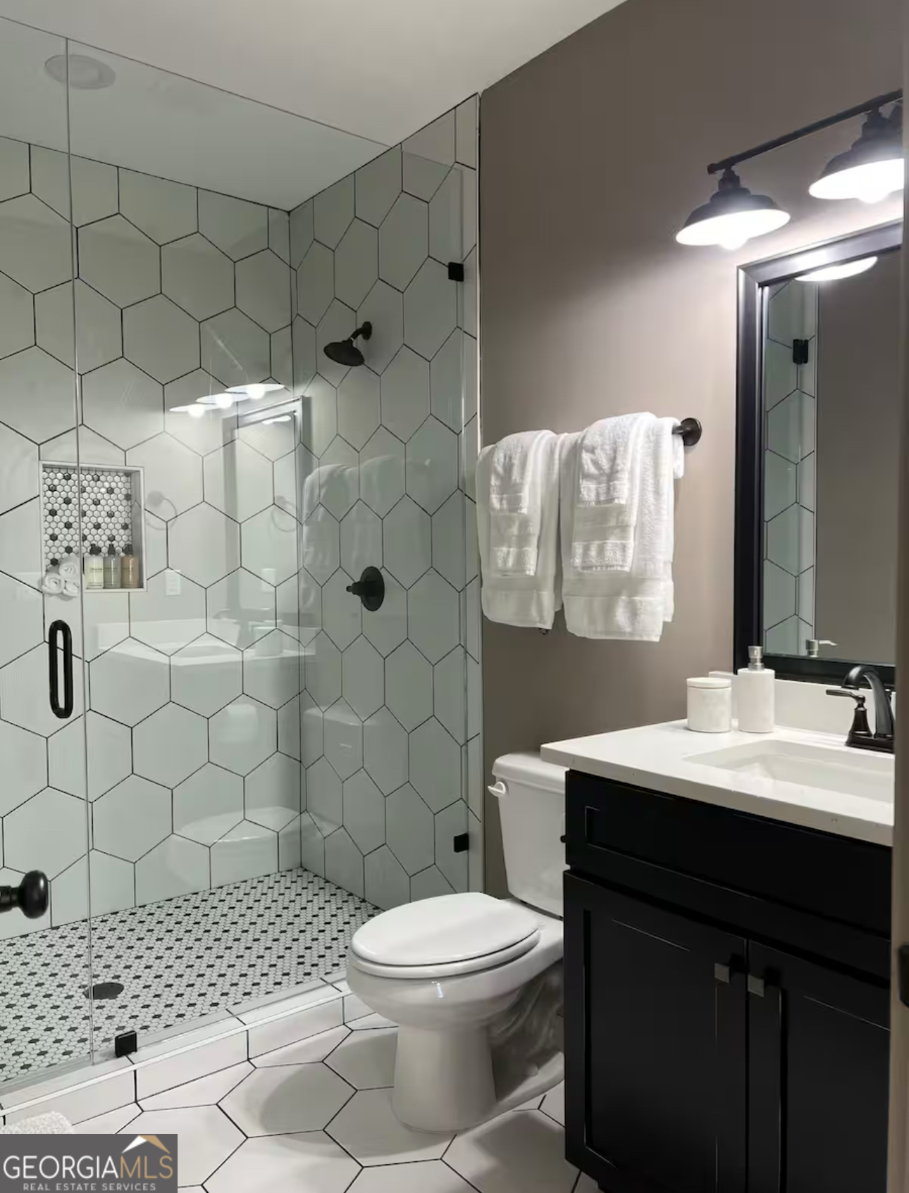 950 Island Shoals Road Jackson, GA 30233 - Photo 15 of 20 a bathroom with a sink toilet and shower