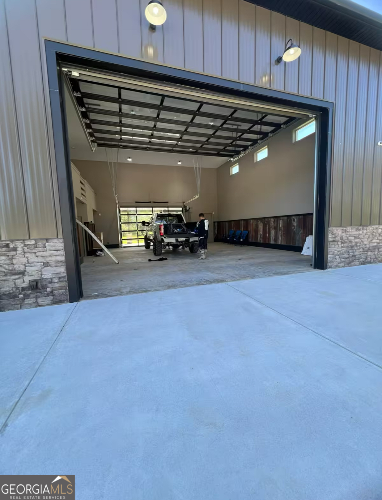 950 Island Shoals Road Jackson, GA 30233 - Photo 3 of 20 a view of a garage with cars