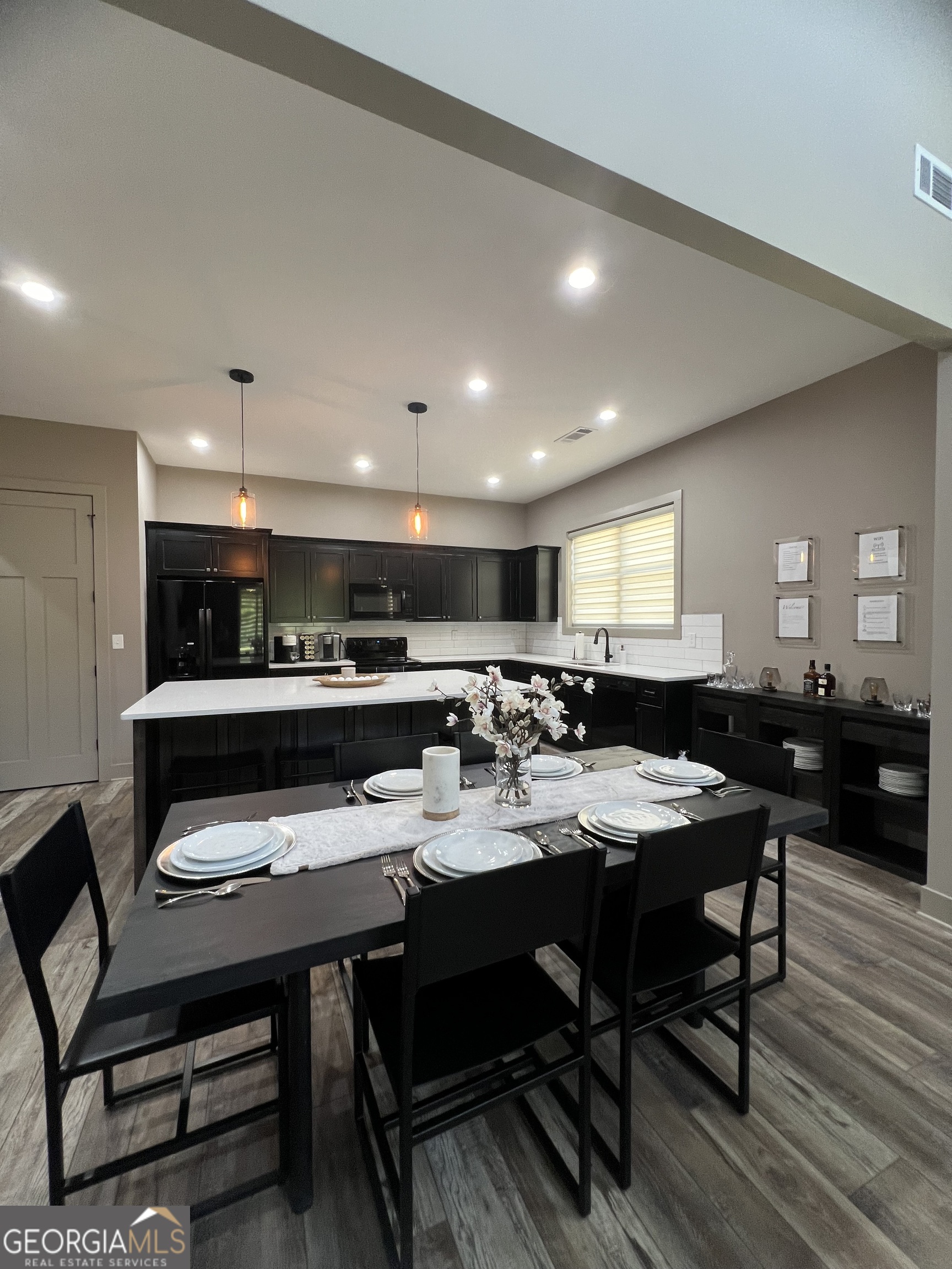 950 Island Shoals Road Jackson, GA 30233 - Photo 4 of 20 a view of a dining room with furniture
