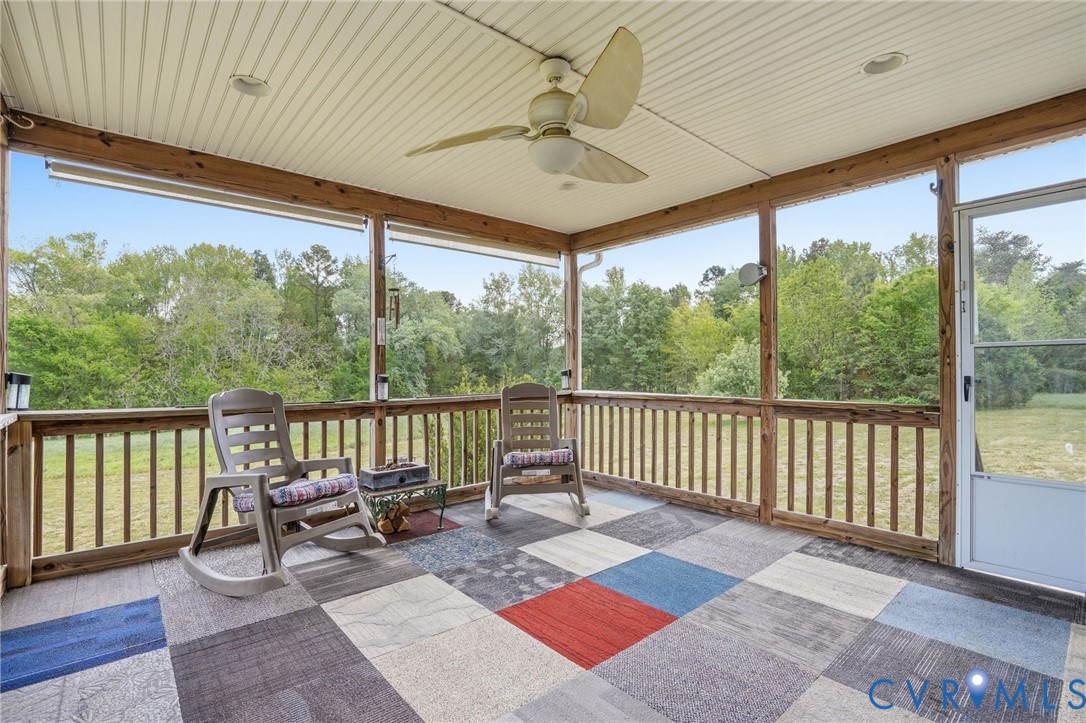 19012 Teman Road Beaverdam, VA 23015 - Photo 29 of 41 a balcony with furniture and wooden floor