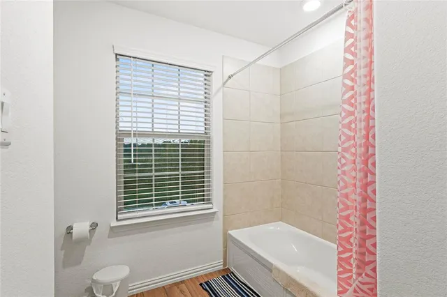 a bathroom with a sink vanity and a mirror