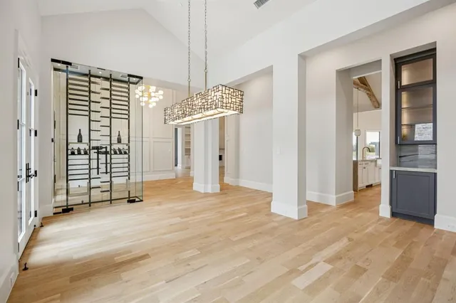 a view of empty room with floor to ceiling window