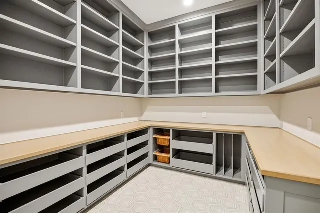 a view of an empty room with empty racks