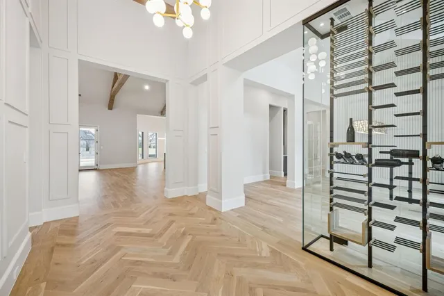 a view of a hallway with a white walls