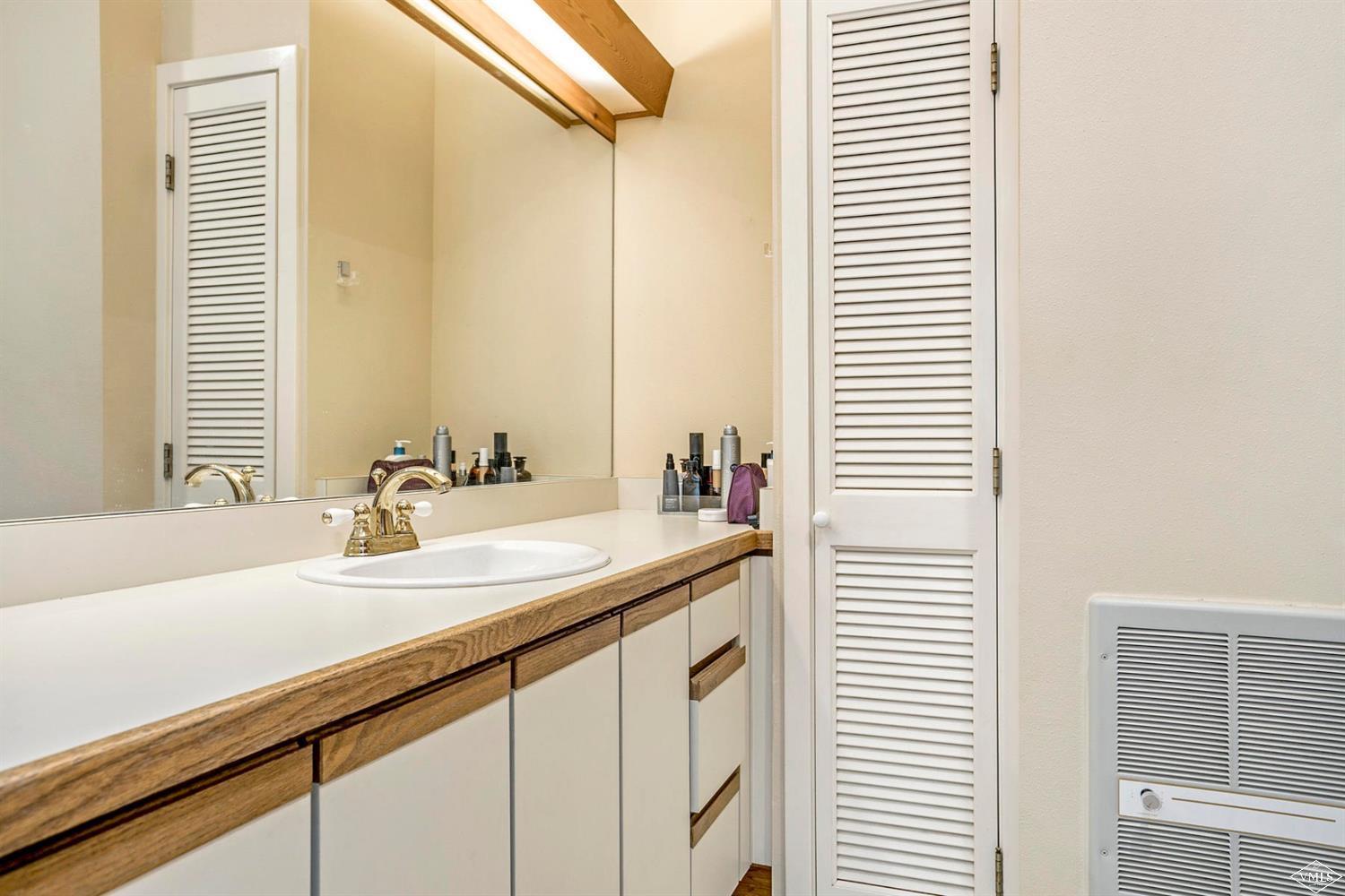 2613 Bear Trap Road Avon, CO 81620 - Photo 23 of 25 a bathroom with a sink and a mirror