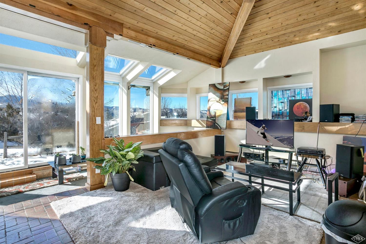 2613 Bear Trap Road Avon, CO 81620 - Photo 4 of 25 a living room filled with furniture