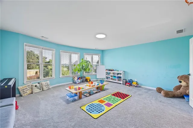 a room with toys and wooden floor