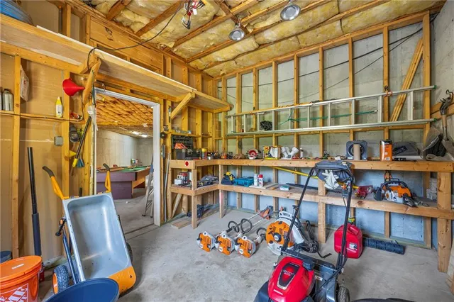 a view of a brick house with many windows