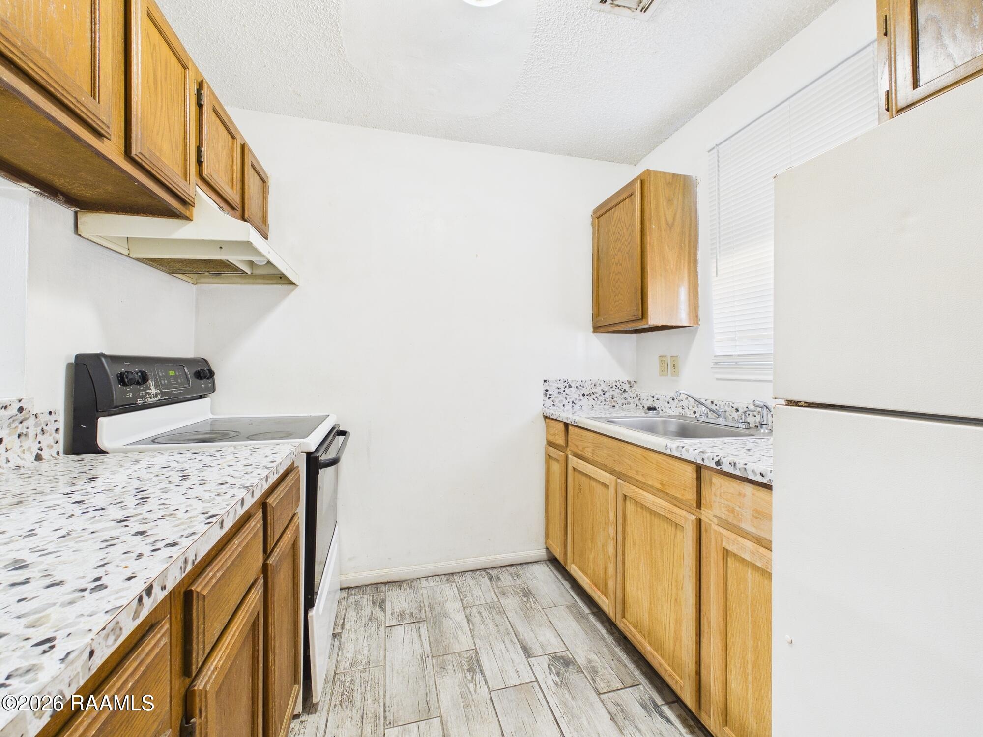 202 Belfast Street, Unit B Lafayette, LA 70506 - Photo 7 of 18 CAM06261G6-PR0025-STILL008