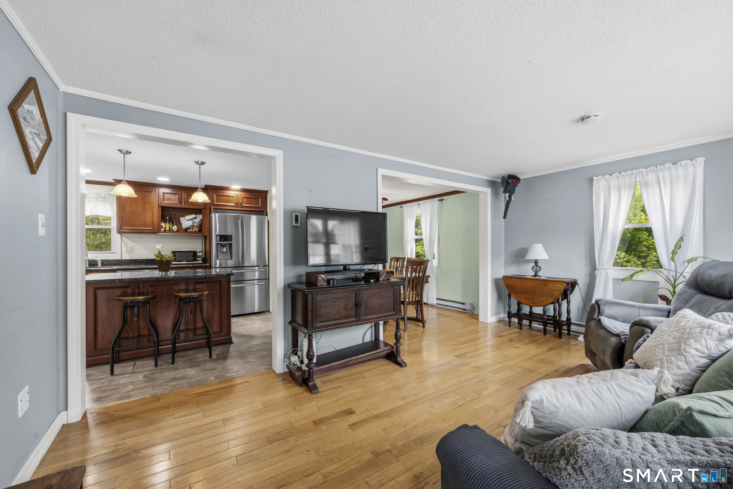 90 Sturtevant Street Norwich, CT 06360 - Photo 40 of 40 Open floor plan flow with hardwood floors and lots of light