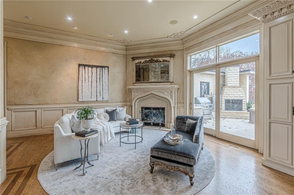 8330 Jett Ferry Road Sandy Springs, GA 30350 - Photo 17 of 98 a living room with furniture or couch and a fireplace