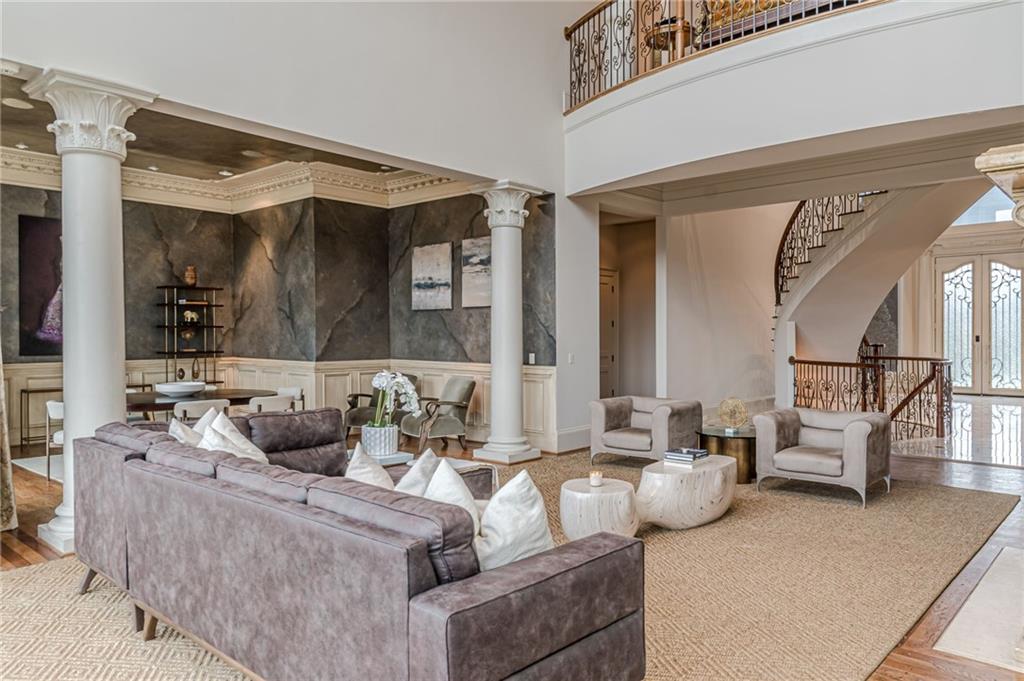 8330 Jett Ferry Road Sandy Springs, GA 30350 - Photo 22 of 98 a living room with furniture and a large window