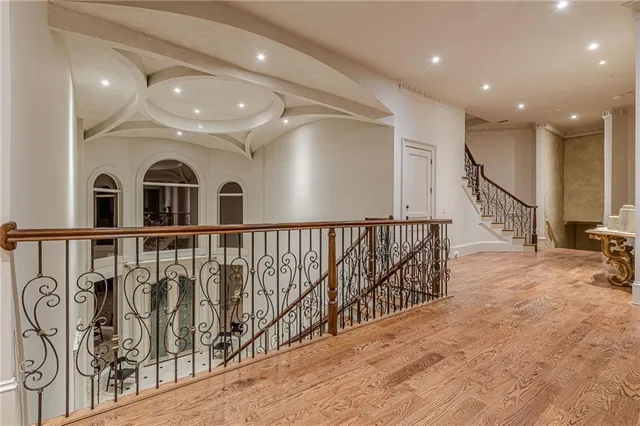 a view of utility room with racks on the wall