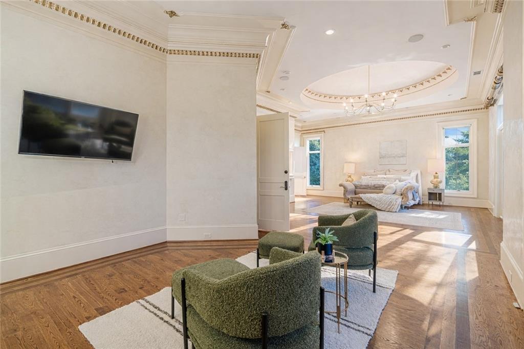 8330 Jett Ferry Road Sandy Springs, GA 30350 - Photo 37 of 98 a living room with furniture and a flat screen tv