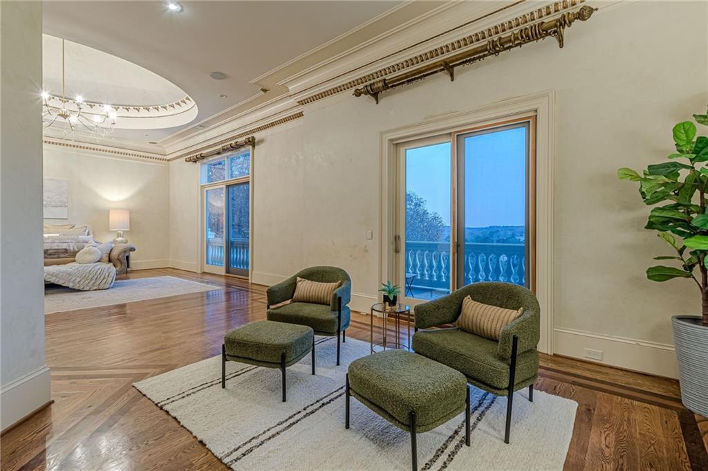 8330 Jett Ferry Road Sandy Springs, GA 30350 - Photo 38 of 98 a living room with furniture and a potted plant