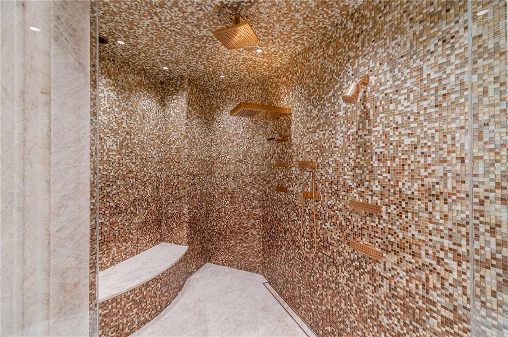 8330 Jett Ferry Road Sandy Springs, GA 30350 - Photo 47 of 98 a bathroom with a shower and a toilet