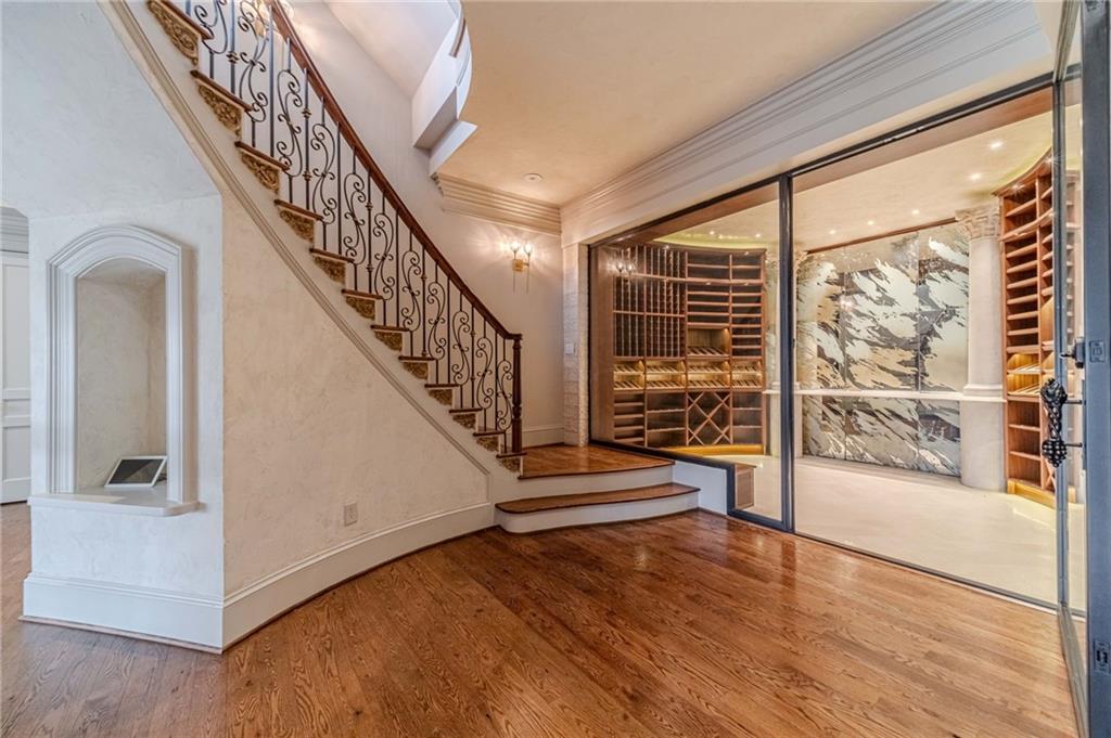 8330 Jett Ferry Road Sandy Springs, GA 30350 - Photo 51 of 98 a view of an entryway with wooden floor door and windows