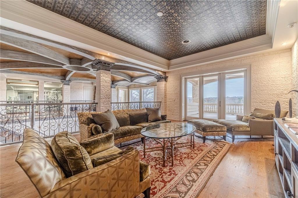 8330 Jett Ferry Road Sandy Springs, GA 30350 - Photo 56 of 98 a living room with furniture and a large window