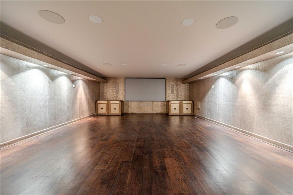 8330 Jett Ferry Road Sandy Springs, GA 30350 - Photo 60 of 98 a view of a room with wooden floor and windows