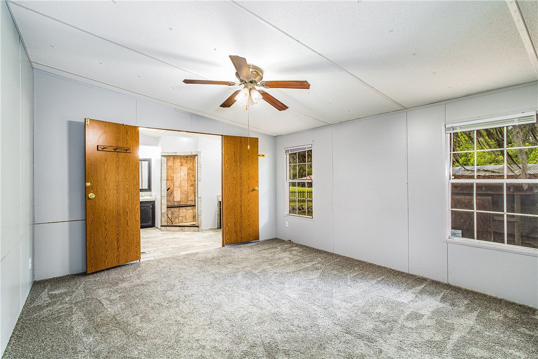 35157 Goodbread Road Callahan, FL 32011 - Photo 19 of 34 a view of empty room with windows