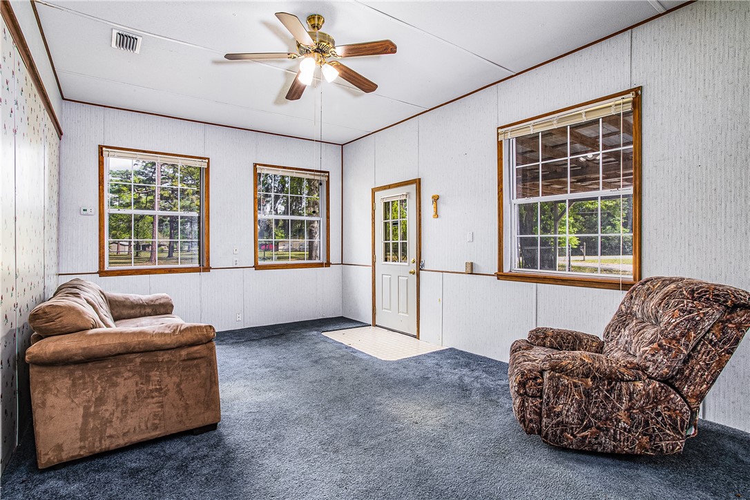 35157 Goodbread Road Callahan, FL 32011 - Photo 24 of 34 a living room with furniture and a window