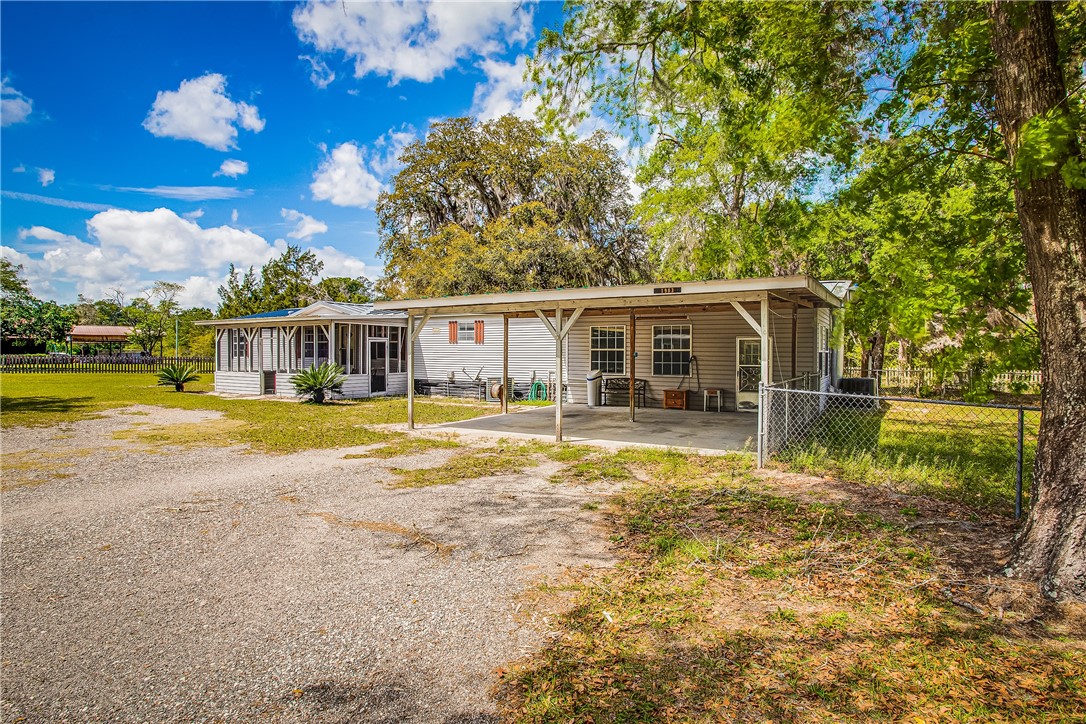 35157 Goodbread Road Callahan, FL 32011 - Photo 34 of 34 a view of a house with a swimming pool