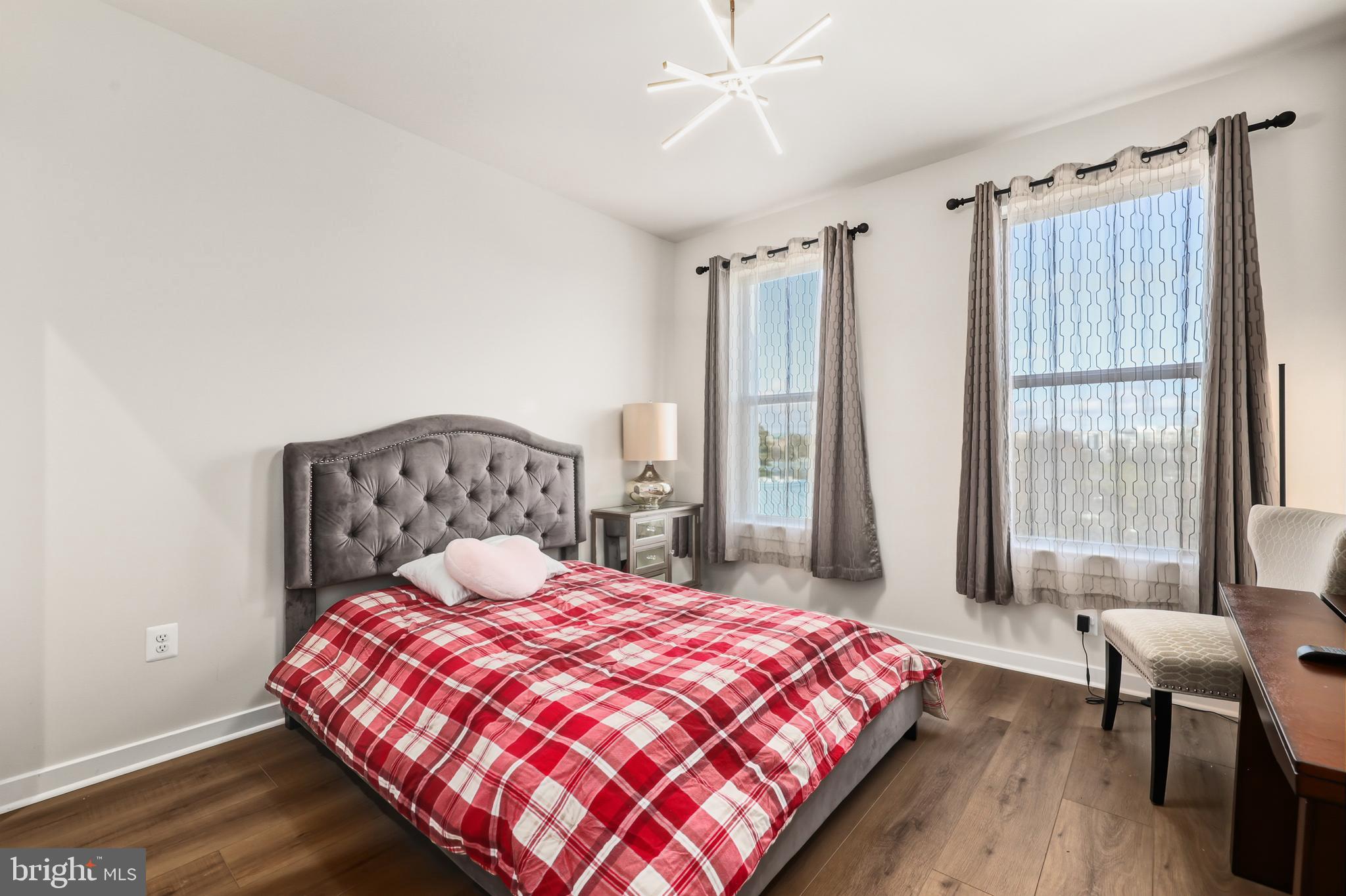 13508 INNOVATION Sta Loop, Unit 3B Herndon, VA 20171 - Photo 20 of 28 a bedroom with a bed and a window