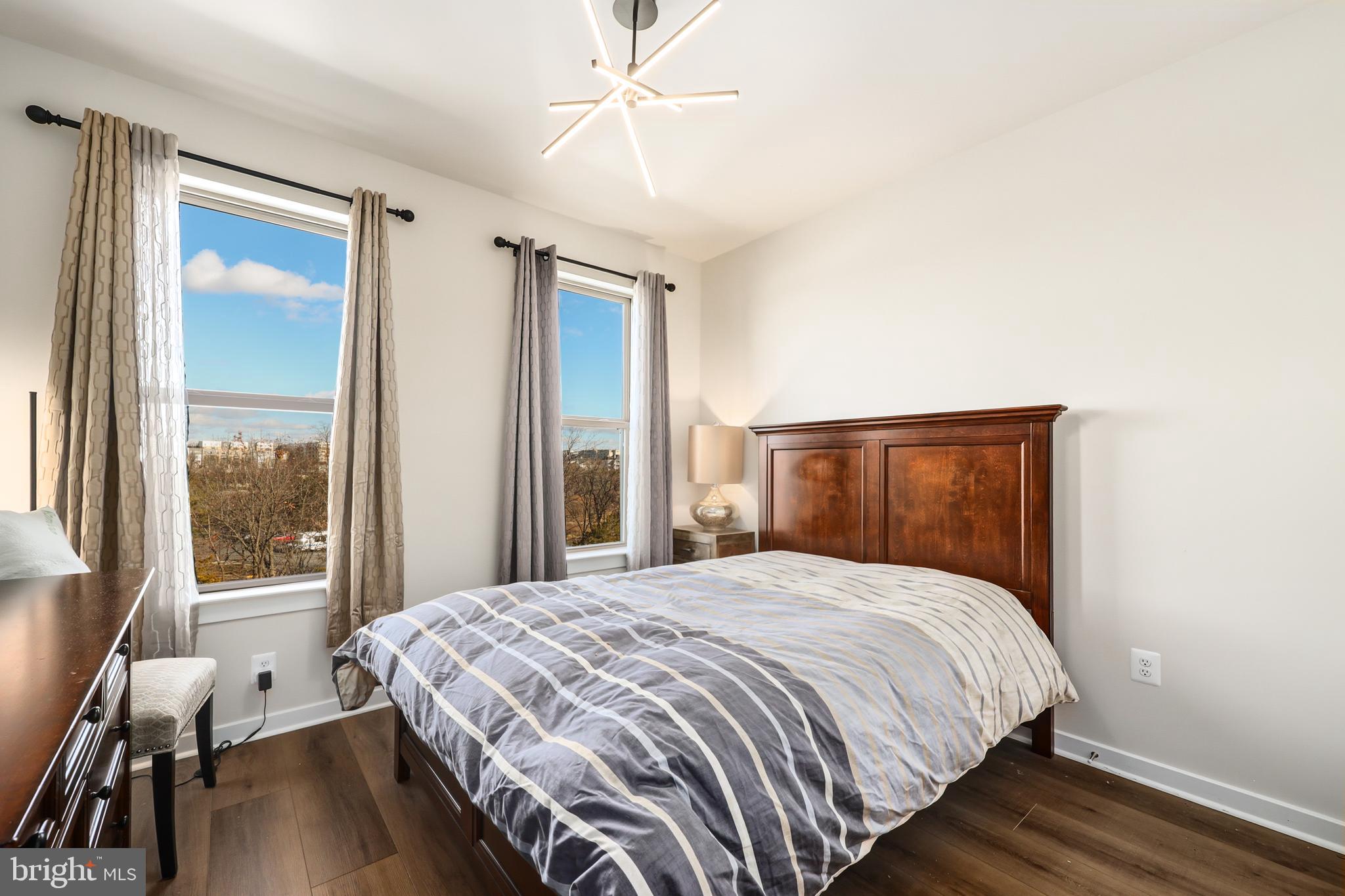 13508 INNOVATION Sta Loop, Unit 3B Herndon, VA 20171 - Photo 22 of 28 a bedroom with a large bed and a window