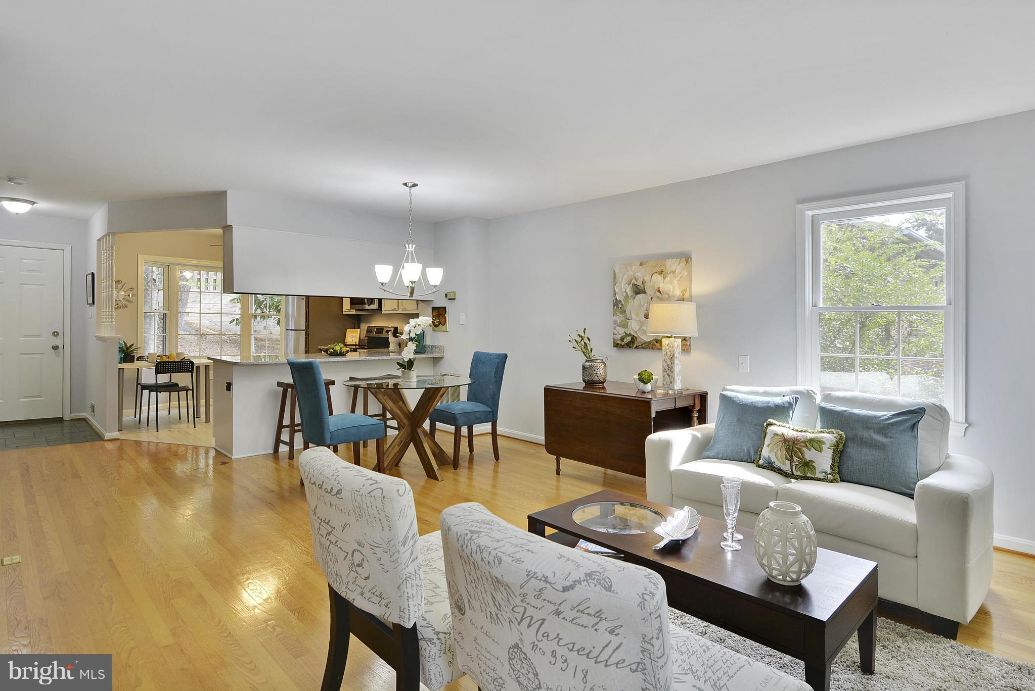 2059 South Glebe Road Arlington, VA 22206 - Photo 3 of 20 a living room with furniture and a large window