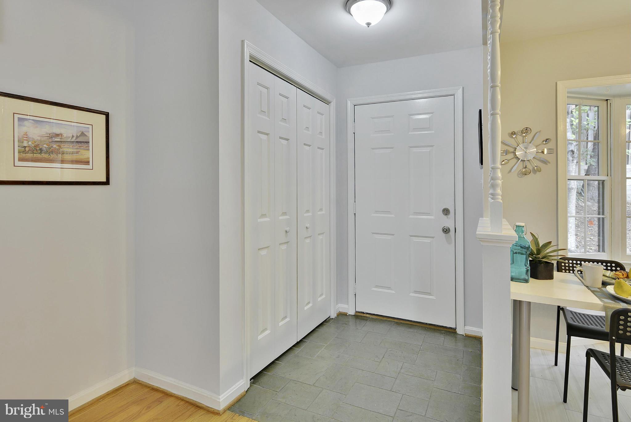 2059 South Glebe Road Arlington, VA 22206 - Photo 4 of 20 a view of a bathroom with sink and mirror