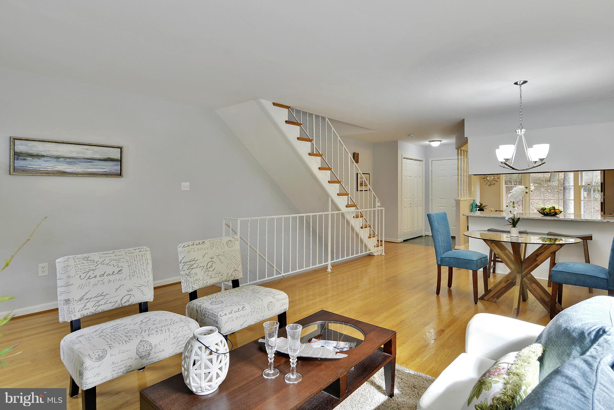 2059 South Glebe Road Arlington, VA 22206 - Photo 8 of 20 a living room with furniture and wooden floor
