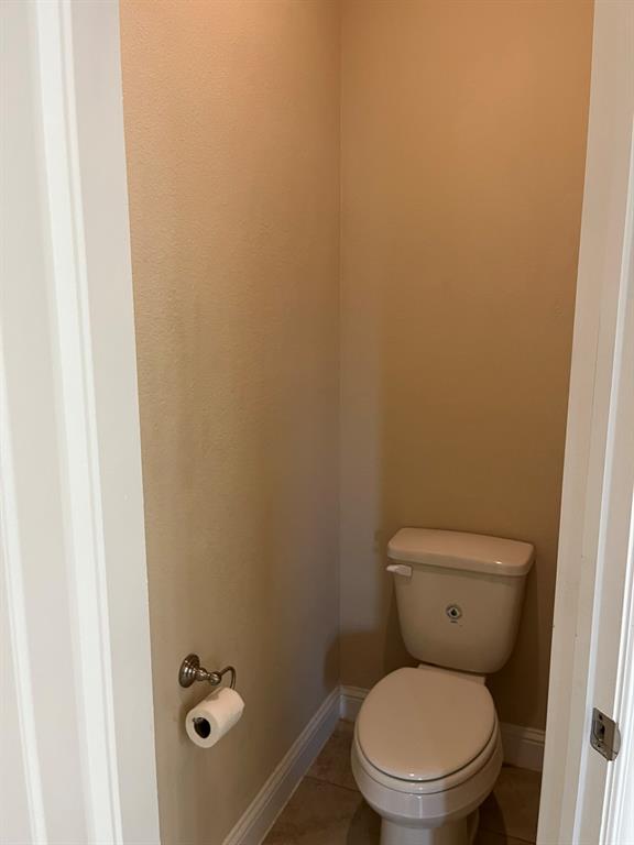 8 Pleasant Valley Sanger, TX 76266 - Photo 13 of 26 a white toilet sitting next to a shower