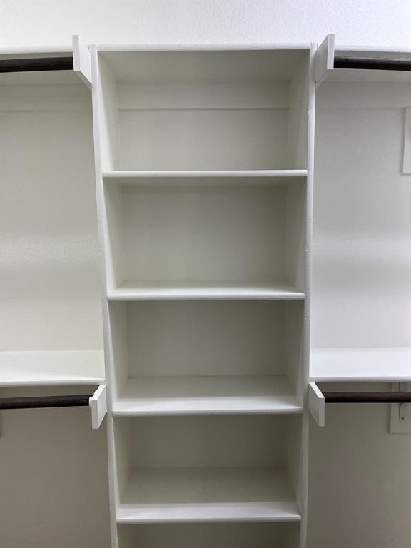 8 Pleasant Valley Sanger, TX 76266 - Photo 15 of 26 a view of walk in closet with empty racks