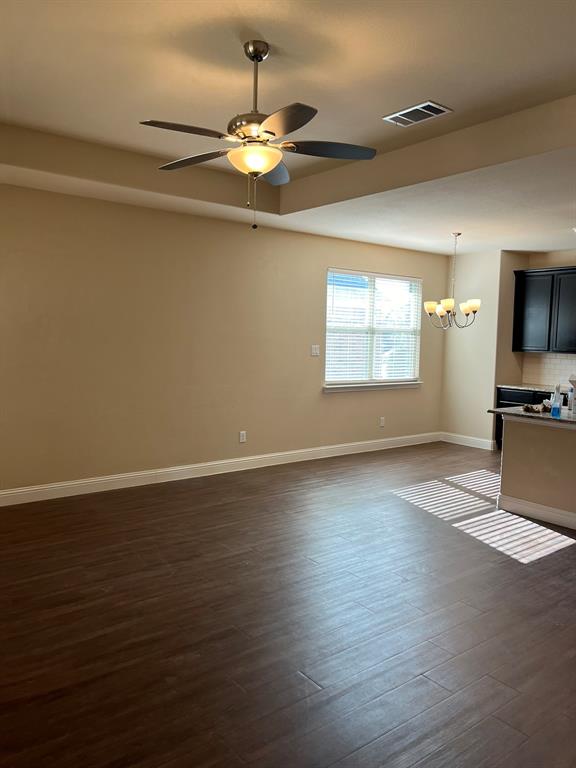 8 Pleasant Valley Sanger, TX 76266 - Photo 9 of 26 wooden floor in an empty room with a window